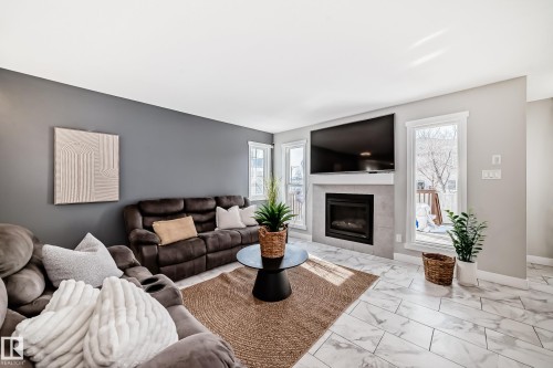 4404 6 Street, Edmonton, AB - Indoor Photo Showing Living Room With Fireplace