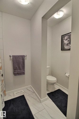 Dedicated water closet featuring a standard toilet - 121 Stiles Bend, Leduc, AB - Indoor Photo Showing Bathroom