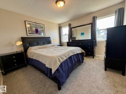 NICE SIZED PRIMARY BEDROOM FOR SPACE FOR AT LEAST A QUEEN SIZE BED! NOTE THE NEW PAINT & CARPET HERE TOO! - 