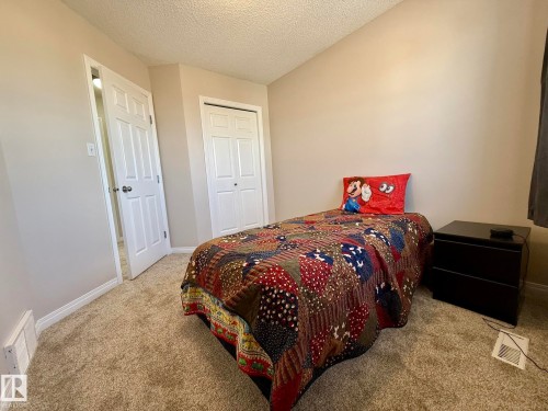 ANOTHER PHOTO OF THE 3d UPPER FLOOR BEDROOM WITH ALL NEW PAINT & PLUSH CARPETING! - 645 Windross Crescent, Edmonton, AB 