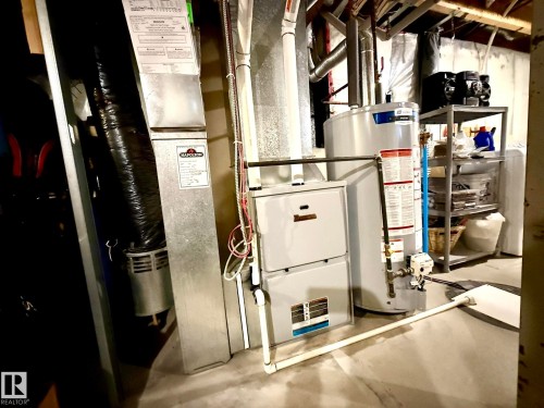 CLOSEUP PHOTO OF THE NEWER H.E. FURNACE & HWT! - 645 Windross Crescent, Edmonton, AB 