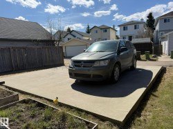 Large concrete parking pad Ready for YOU to Build a GARAGE! - 