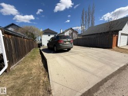Concrete driveway with a two-car FUTURE GARAGE! - 