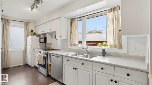 10651 61 Street, Edmonton, AB - Indoor Photo Showing Kitchen With Double Sink