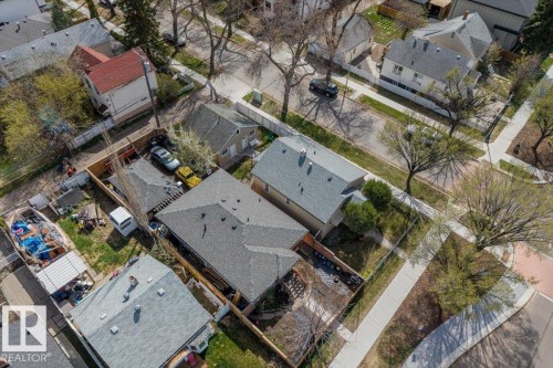 Aerial perspective showcasing a residential neighborhood with streets and sidewalks - 10939 96 Street, Edmonton, AB - Outdoor With View