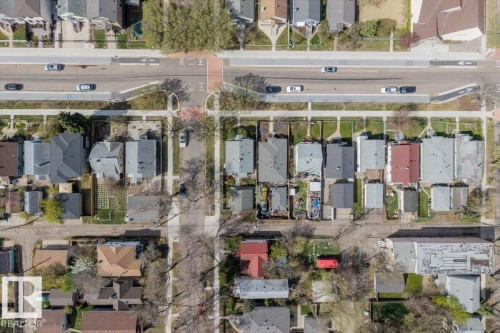 Aerial Property Overview. Illustrating the property's location within a residential area, including surrounding structures and thoroughfares - 10939 96 Street, Edmonton, AB -  With View