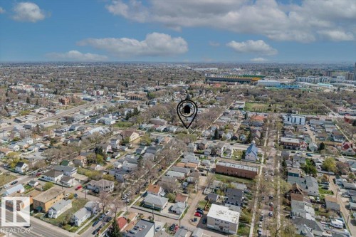 Aerial perspective showcasing a residential area with varied architectural styles and established tree-lined streets - 10939 96 Street, Edmonton, AB - Outdoor With View