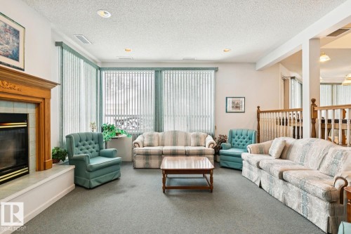 303 Twin Brooks Drive, Edmonton, AB - Indoor Photo Showing Living Room With Fireplace