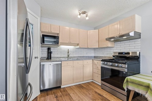 9638 108A Avenue, Edmonton, AB - Indoor Photo Showing Kitchen With Double Sink