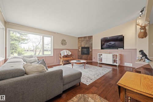 5101 45 Avenue, Leduc, AB - Indoor Photo Showing Living Room With Fireplace