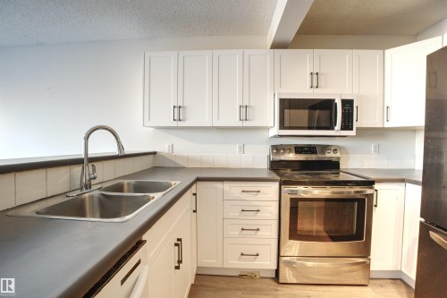 145 Crocus Crescent, Sherwood Park, AB - Indoor Photo Showing Kitchen With Double Sink