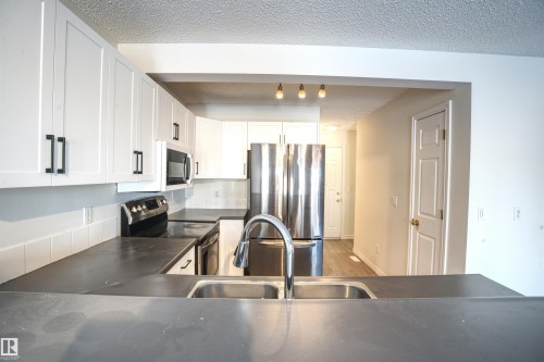 145 Crocus Crescent, Sherwood Park, AB - Indoor Photo Showing Kitchen With Double Sink