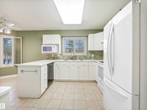 146 Oeming Road, Edmonton, AB - Indoor Photo Showing Kitchen With Double Sink