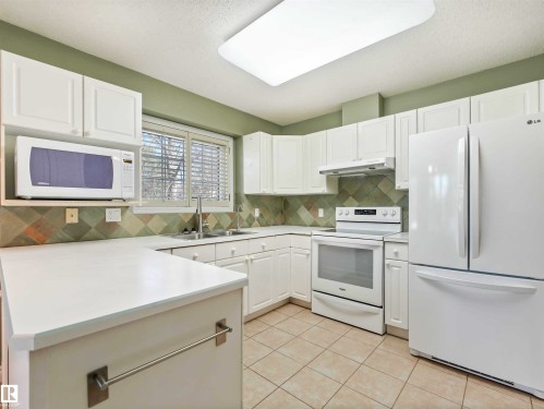 146 Oeming Road, Edmonton, AB - Indoor Photo Showing Kitchen With Double Sink