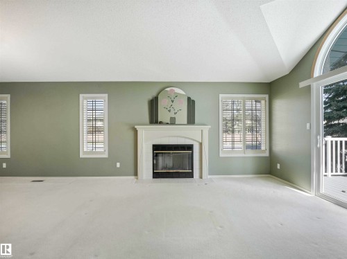 146 Oeming Road, Edmonton, AB - Indoor Photo Showing Living Room With Fireplace