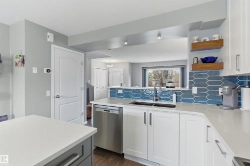 107 Michigan Street, Devon, AB - Indoor Photo Showing Kitchen With Double Sink