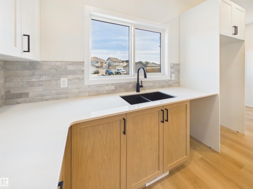 35 Sereno Lane, Fort Saskatchewan, AB - Indoor Photo Showing Kitchen With Double Sink