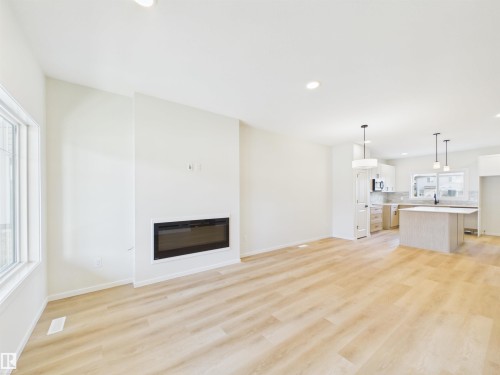 35 Sereno Lane, Fort Saskatchewan, AB - Indoor Photo Showing Living Room With Fireplace