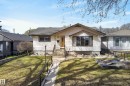 Single-story residence featuring light-colored siding and dark trim - 12016 51 Street, Edmonton, AB  - Outdoor 