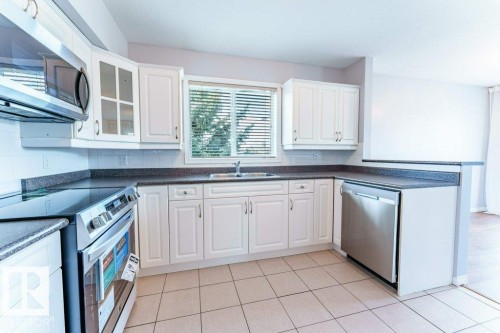 12 2505 42 Street, Edmonton, AB - Indoor Photo Showing Kitchen With Double Sink