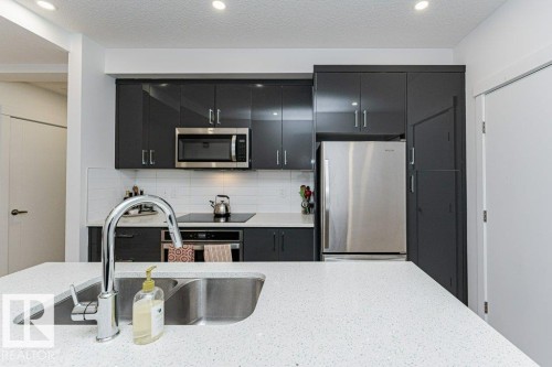 214 11503 76 Avenue, Edmonton, AB - Indoor Photo Showing Kitchen With Upgraded Kitchen