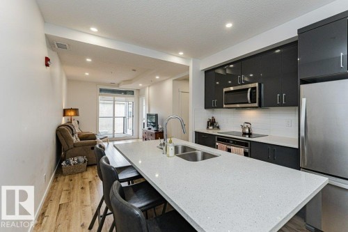 214 11503 76 Avenue, Edmonton, AB - Indoor Photo Showing Kitchen With Double Sink With Upgraded Kitchen