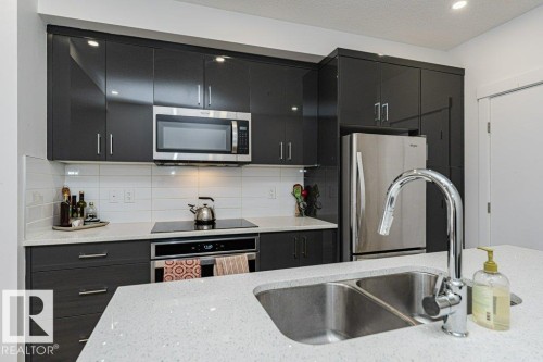 214 11503 76 Avenue, Edmonton, AB - Indoor Photo Showing Kitchen With Double Sink With Upgraded Kitchen