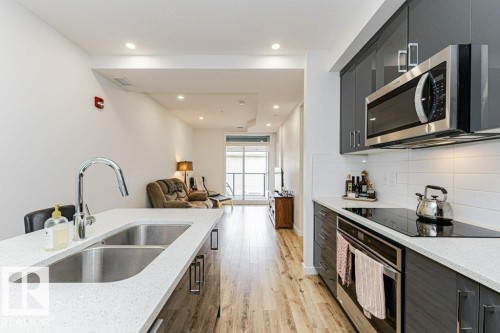 214 11503 76 Avenue, Edmonton, AB - Indoor Photo Showing Kitchen With Double Sink With Upgraded Kitchen