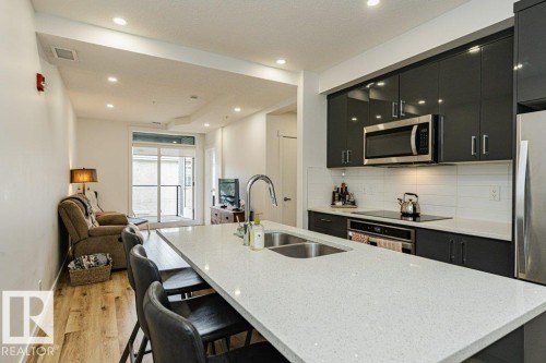 214 11503 76 Avenue, Edmonton, AB - Indoor Photo Showing Kitchen With Double Sink With Upgraded Kitchen
