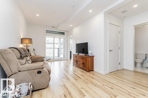 214 11503 76 Avenue, Edmonton, AB - Indoor Photo Showing Living Room