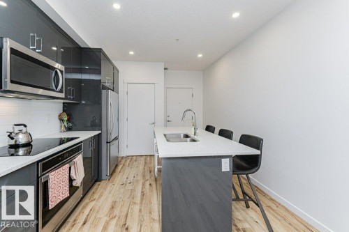 214 11503 76 Avenue, Edmonton, AB - Indoor Photo Showing Kitchen With Double Sink With Upgraded Kitchen