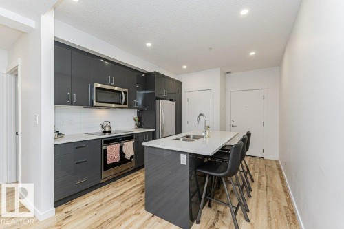 214 11503 76 Avenue, Edmonton, AB - Indoor Photo Showing Kitchen With Double Sink With Upgraded Kitchen