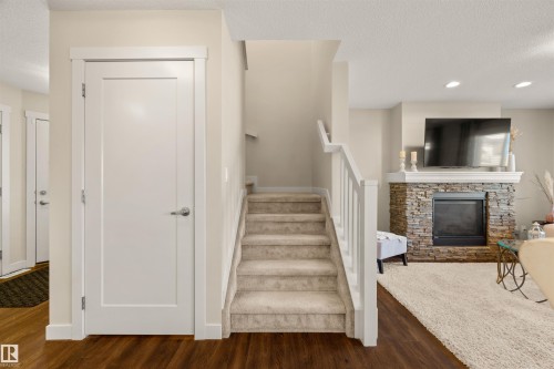 2256 Casey Crescent, Edmonton, AB - Indoor Photo Showing Other Room With Fireplace