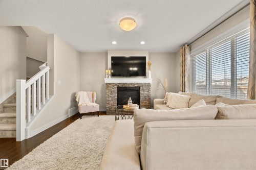 2256 Casey Crescent, Edmonton, AB - Indoor Photo Showing Living Room With Fireplace