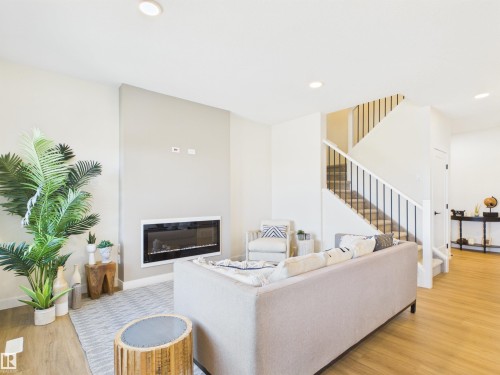 53 Sumac Close, Fort Saskatchewan, AB - Indoor Photo Showing Living Room With Fireplace