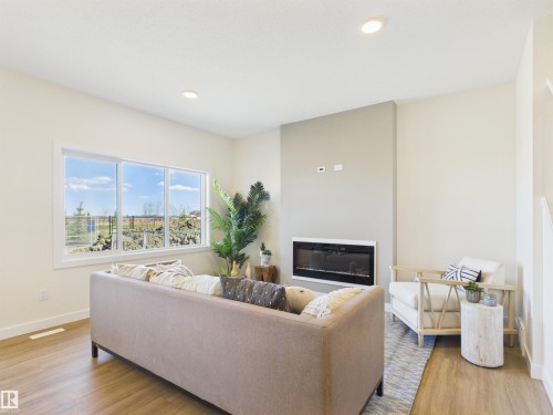 53 Sumac Close, Fort Saskatchewan, AB - Indoor Photo Showing Living Room With Fireplace