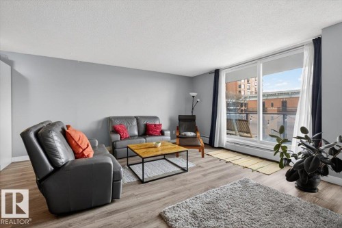 #405 10011 116 St Nw, Edmonton, AB - Indoor Photo Showing Living Room