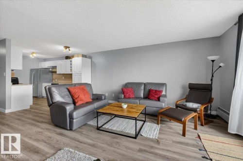 #405 10011 116 St Nw, Edmonton, AB - Indoor Photo Showing Living Room