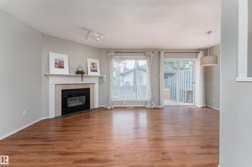 121 Bulyea Road, Edmonton, AB - Indoor Photo Showing Living Room With Fireplace