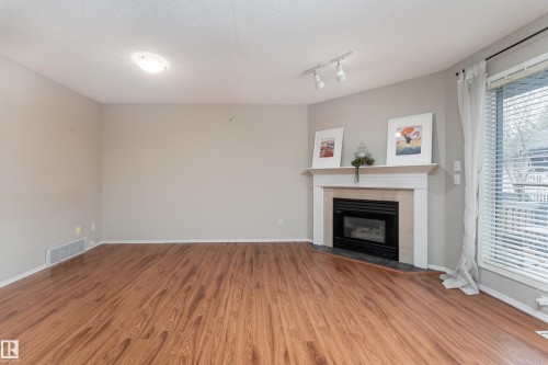 121 Bulyea Road, Edmonton, AB - Indoor Photo Showing Living Room With Fireplace