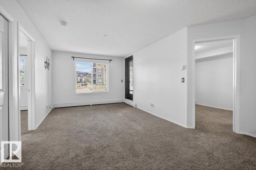 117 12035 22 Av, Edmonton, AB - Indoor Photo Showing Other Room