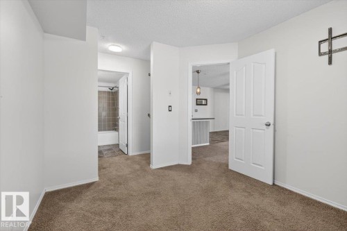 117 12035 22 Av, Edmonton, AB - Indoor Photo Showing Other Room
