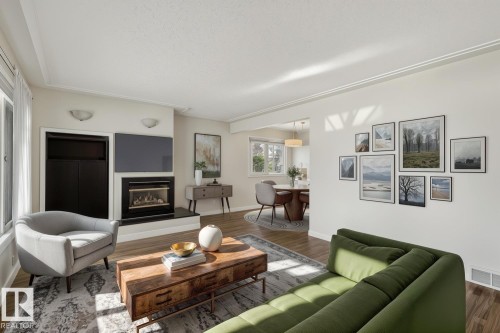 11451 48 Avenue, Edmonton, AB - Indoor Photo Showing Living Room With Fireplace