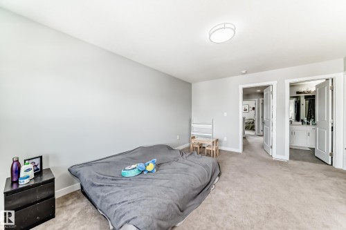 This room features light gray walls and plush carpeting, creating a neutral and inviting atmosphere - 19635 29 Avenue, Edmonton, AB - Indoor Photo Showing Bedroom
