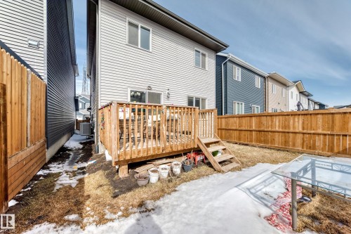 The property features a private backyard area with a wooden deck and fencing - 19635 29 Avenue, Edmonton, AB - Outdoor With Deck Patio Veranda With Exterior