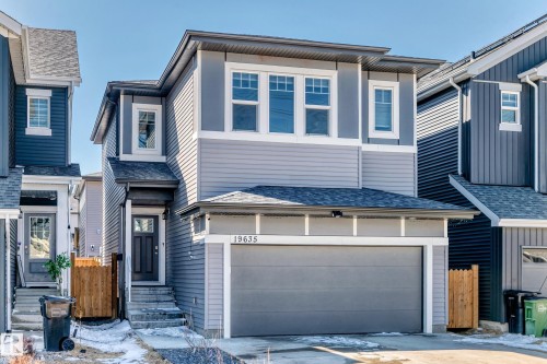 Modern two-story home featuring a two-tone gray facade with horizontal and vertical siding accents - 19635 29 Avenue, Edmonton, AB - Outdoor With Facade