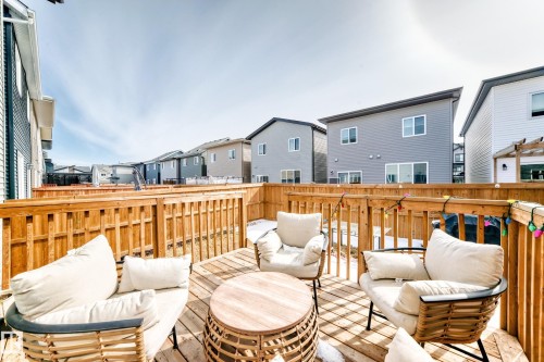The property features a spacious wooden deck with a privacy fence - 19635 29 Avenue, Edmonton, AB - Outdoor With Exterior