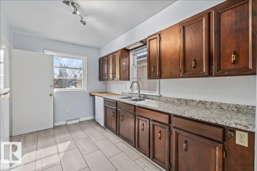 11227 52 Street, Edmonton, AB - Indoor Photo Showing Kitchen With Double Sink