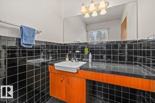 Spacious bath ready for a renovation - 9732 64 Street, Edmonton, AB - Indoor Photo Showing Bathroom