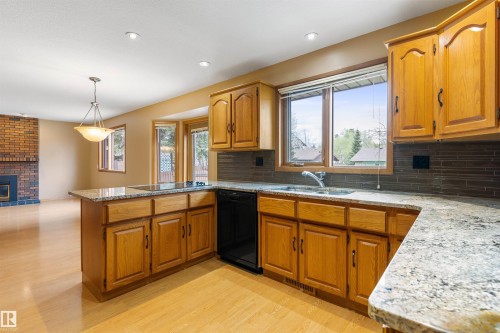 44 Whitehall Crescent, St. Albert, AB - Indoor Photo Showing Kitchen With Fireplace With Double Sink